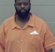 A $50k bond was set for a Pine Bluff man accused of being a felon in possession of a firearm