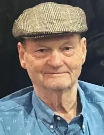 Earle McDaniel, 83