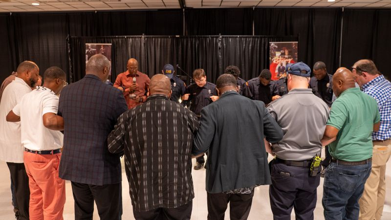 Firefighters participating in the Firefighters prayer